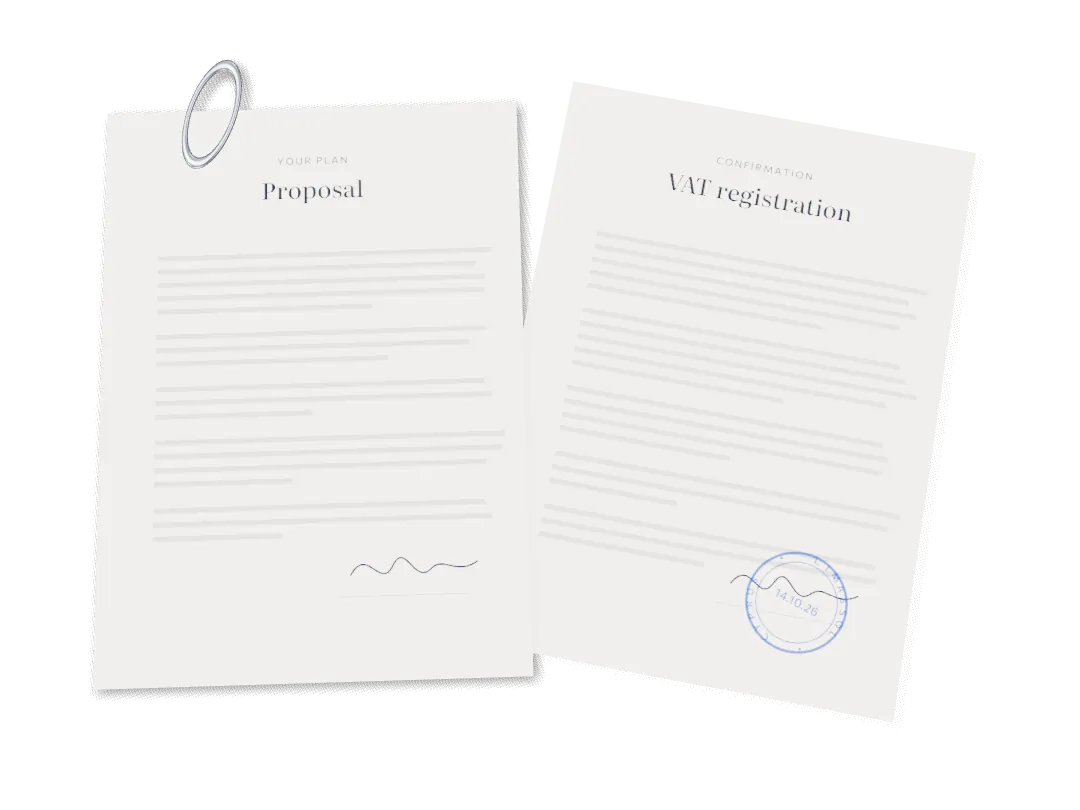 A VAT registration confirmation, a paper clip and a proposal on a desk.