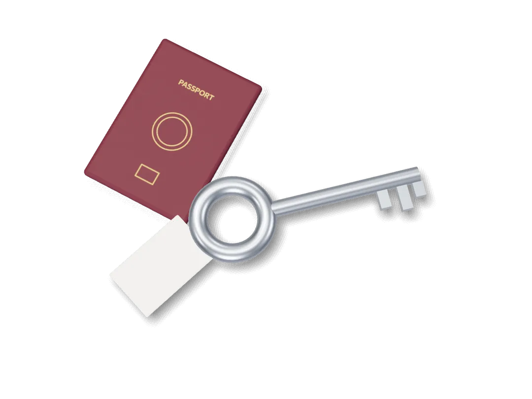 A passport and a set of keys on a desk.